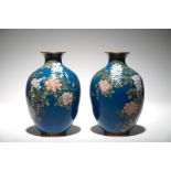 A pair of Japanese blue-ground cloisonné vases, Meiji, late 19th C.