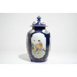 A Chinese powder blue-ground famille rose covered jar, Republic, 20th C.