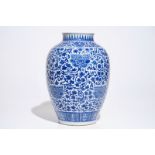 A Chinese blue and white peony scroll vase, 19th C.