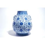 A Chinese blue and white lotus scroll hu vase, Qianlong mark, 20th C.