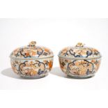 A pair of round Japanese Imari tureens and covers, Edo, early 18th C.