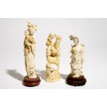 Two Chinese carved ivory figures of Guanyin and a Japanese okimono, 19/20th C.