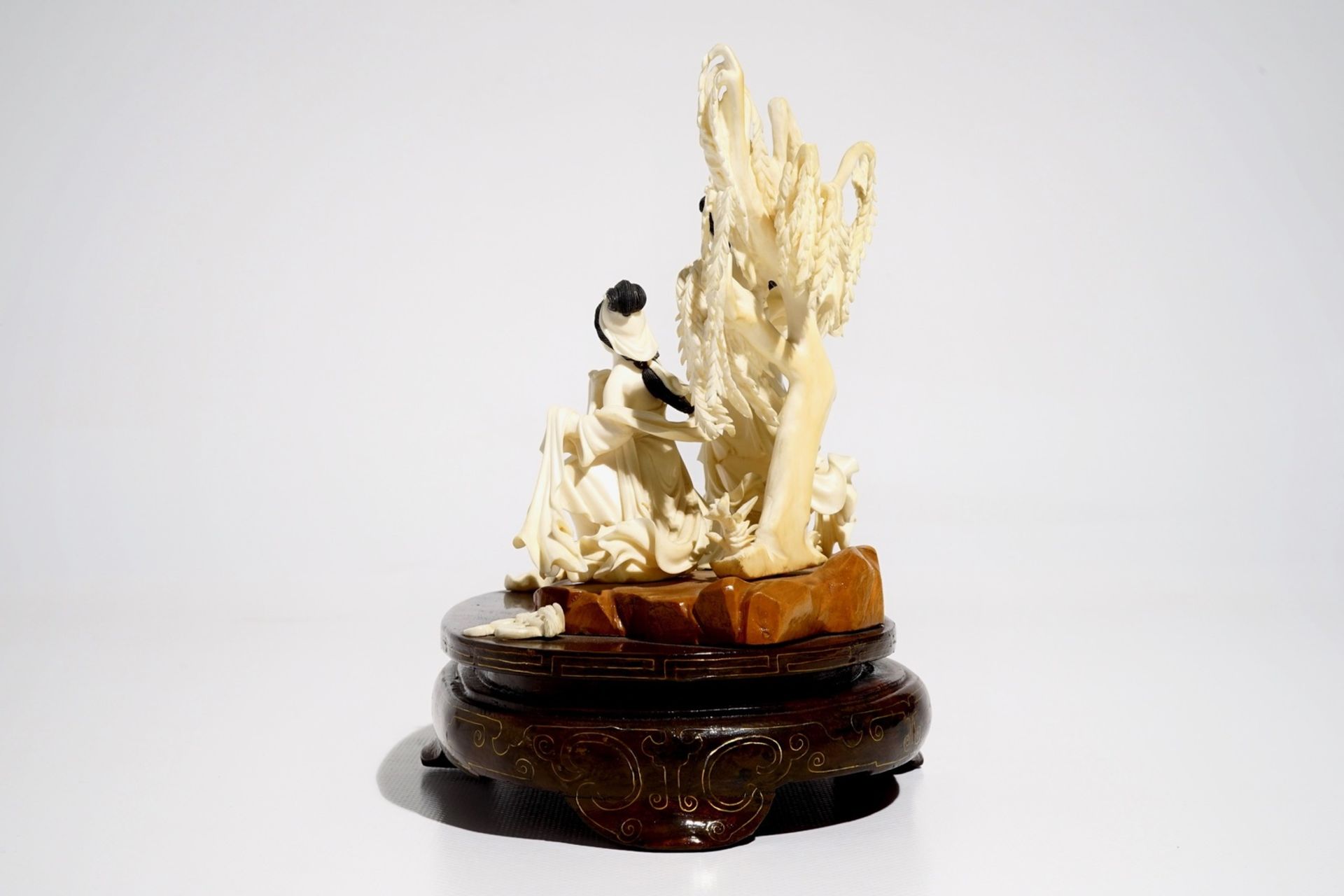 A Chinese carved ivory group of two ladies on wooden base, 2nd quarter 20th C. - Image 4 of 6