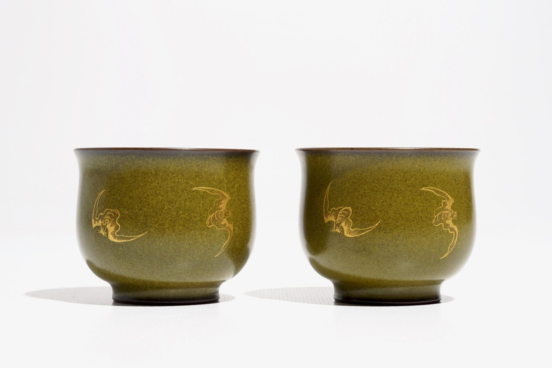 A pair of Chinese teadust-glazed and gilt wine cups with bats, Qianlong mark, 20th C. - Image 2 of 7