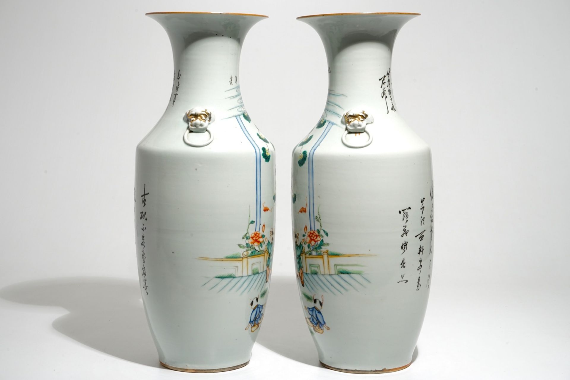 A pair of Chinese famille rose vases with playing boys, 19/20th C. - Image 4 of 6