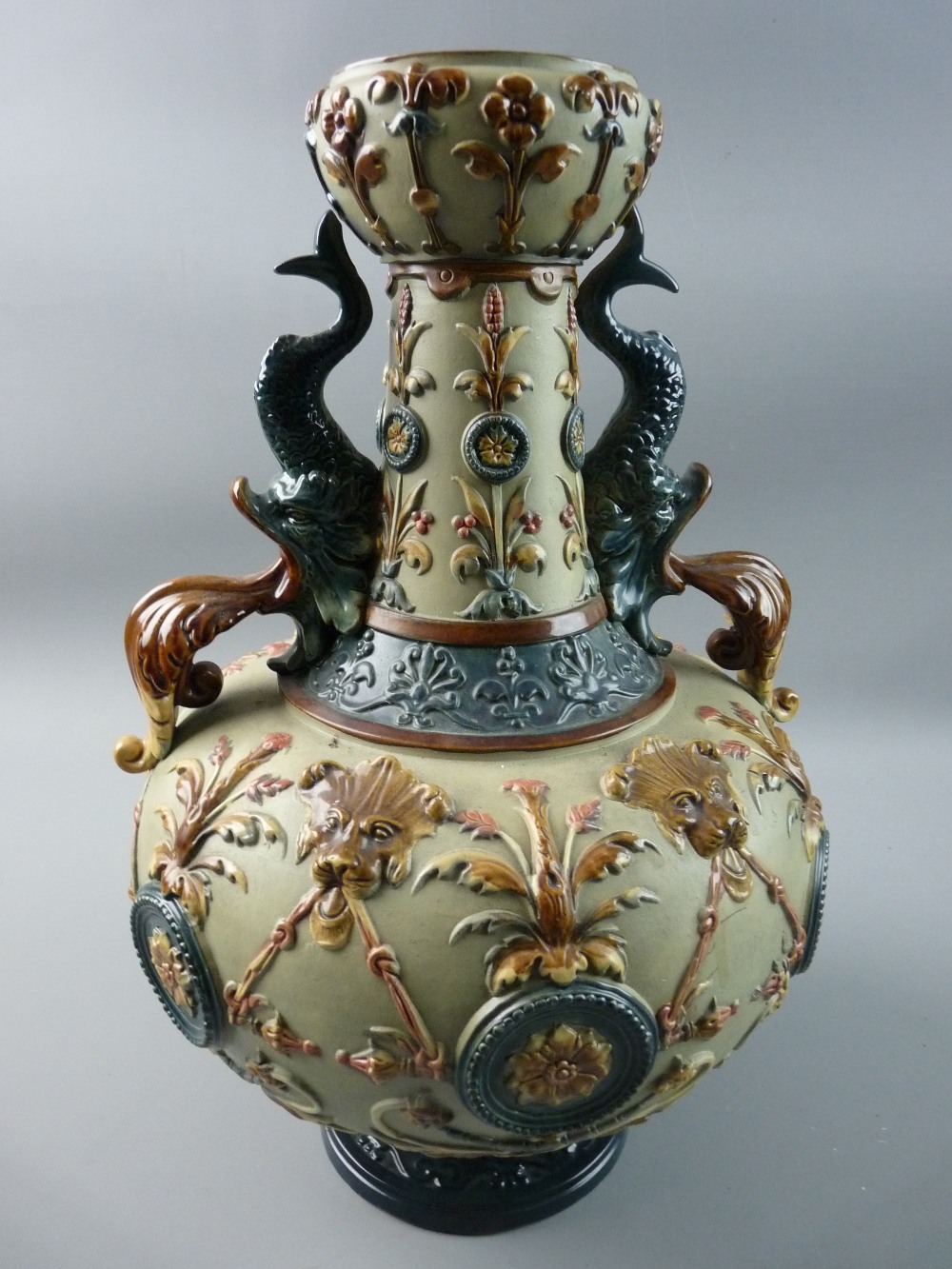 A LATE 19th CENTURY CONTINENTAL MAJOLICA TWIN HANDLED VASE by Wilhelm Schiller & Son, applied floral