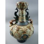 A LATE 19th CENTURY CONTINENTAL MAJOLICA TWIN HANDLED VASE by Wilhelm Schiller & Son, applied floral