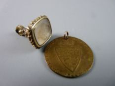 A GOLD PENDANT SEAL FOB, 6.5 grms and a 1788 spade guinea