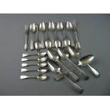 TWENTY PIECES OF SILVER FLATWARE, fiddle patterned of plain form and all bar one fork with