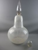 A LARGE ONION SHAPED CHEMIST'S DISPLAY BOTTLE having an oversized teardrop facet cut stopper with