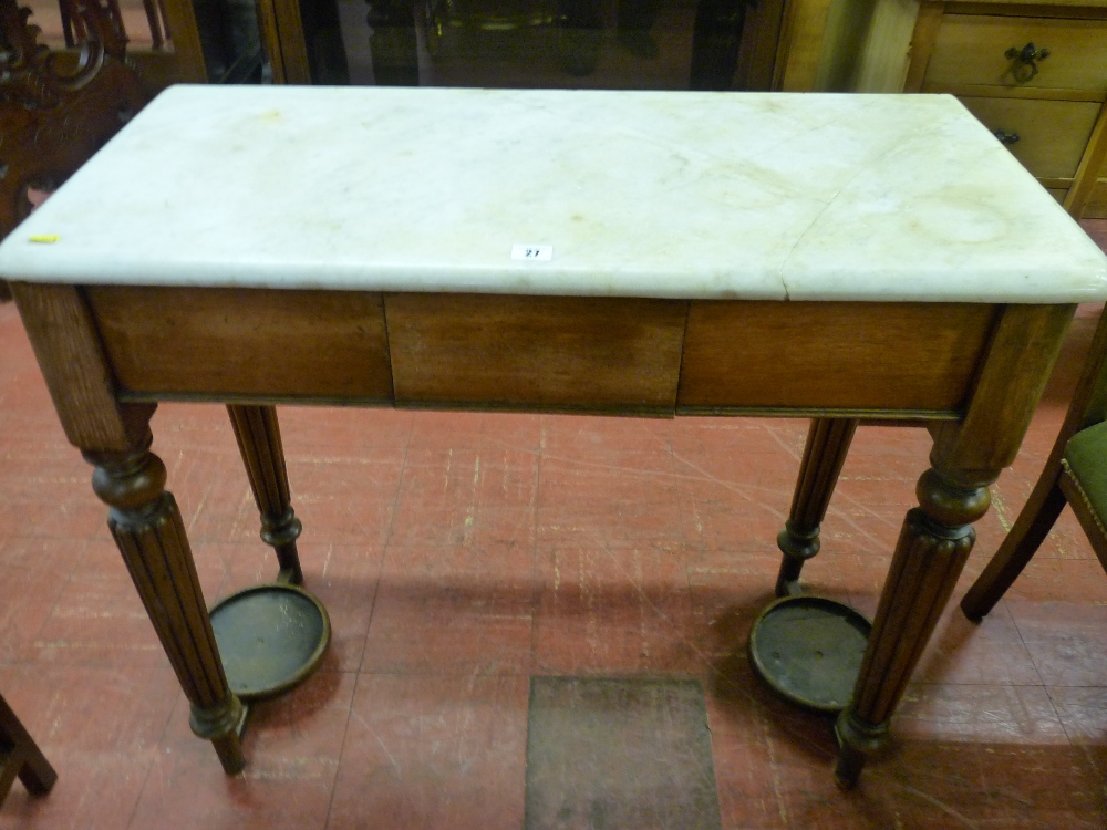 A VICTORIAN MAHOGANY MARBLE TOPPED WASHSTAND with single frieze drawer and circular cornered