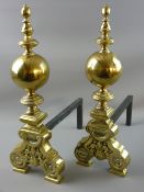 A LARGE PAIR OF TURNED AND CAST BRASS FIREDOGS, 52 cms high
