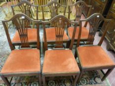 GOOD SET OF SIX COUNTRY OAK DINING CHAIRS having swept top rails with a pierced splat and