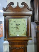 A GEORGIAN OAK AND MAHOGANY LONGCASE CLOCK by William Evans, Shrewsbury, the hood with broken swan