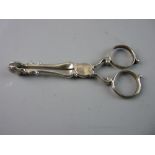 A PAIR OF GEORGIAN SILVER SUGAR NIPS, believed Continental, 1 troy oz