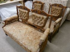 AN INLAID MAHOGANY THREE PIECE LOUNGE SUITE, circa 1900 of two seater couch and matching