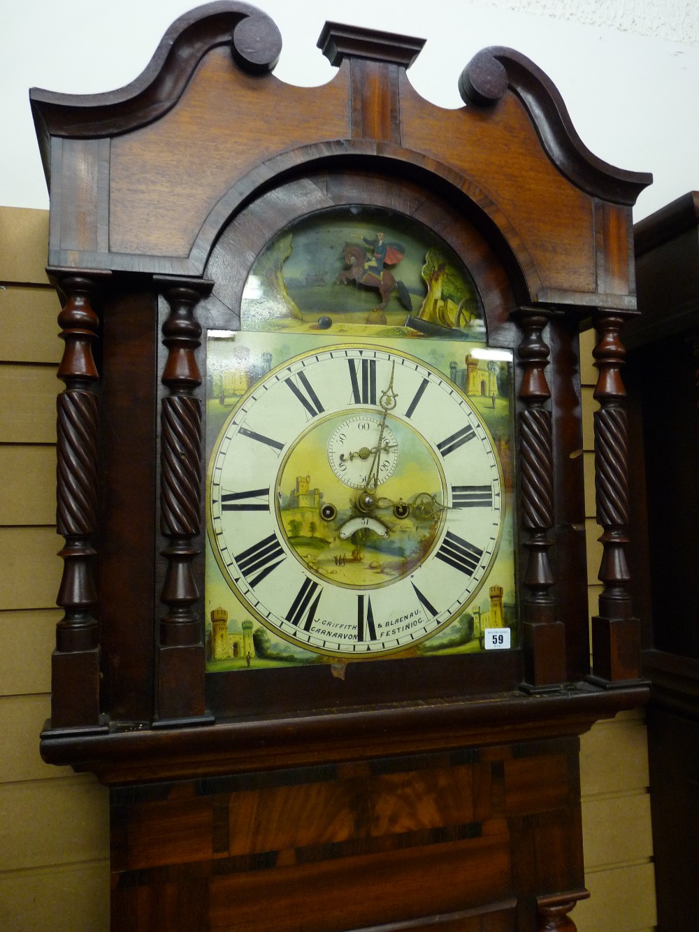 A VICTORIAN MAHOGANY LONGCASE CLOCK by J Griffith, Carnarvon and Blaenau Ffestiniog, 14 ins arched