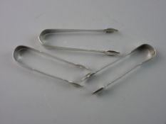 TWO SILVER FIDDLE PATTERN PLAIN SUGAR NIPS AND ANOTHER, all 19th Century, 3.3 troy ozs, two