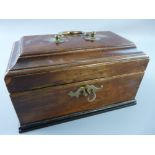 A GEORGIAN MAHOGANY OBLONG TOP TEA CADDY with metal top handle, interior lidded tea compartment with