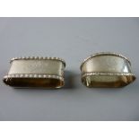 TWO OVAL SILVER NAPKIN RINGS, Chester 1915 and London 1917, 2 troy ozs, each monogrammed and dated