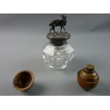 A HEAVY HEXAGONAL SHAPED GLASS INKWELL from an inkstand with hinged Britannia metal lid and stag and