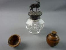 A HEAVY HEXAGONAL SHAPED GLASS INKWELL from an inkstand with hinged Britannia metal lid and stag and