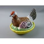 A LATE 19th CENTURY STAFFORDSHIRE POTTERY HEN ON NEST, well preserved with good colouring, the