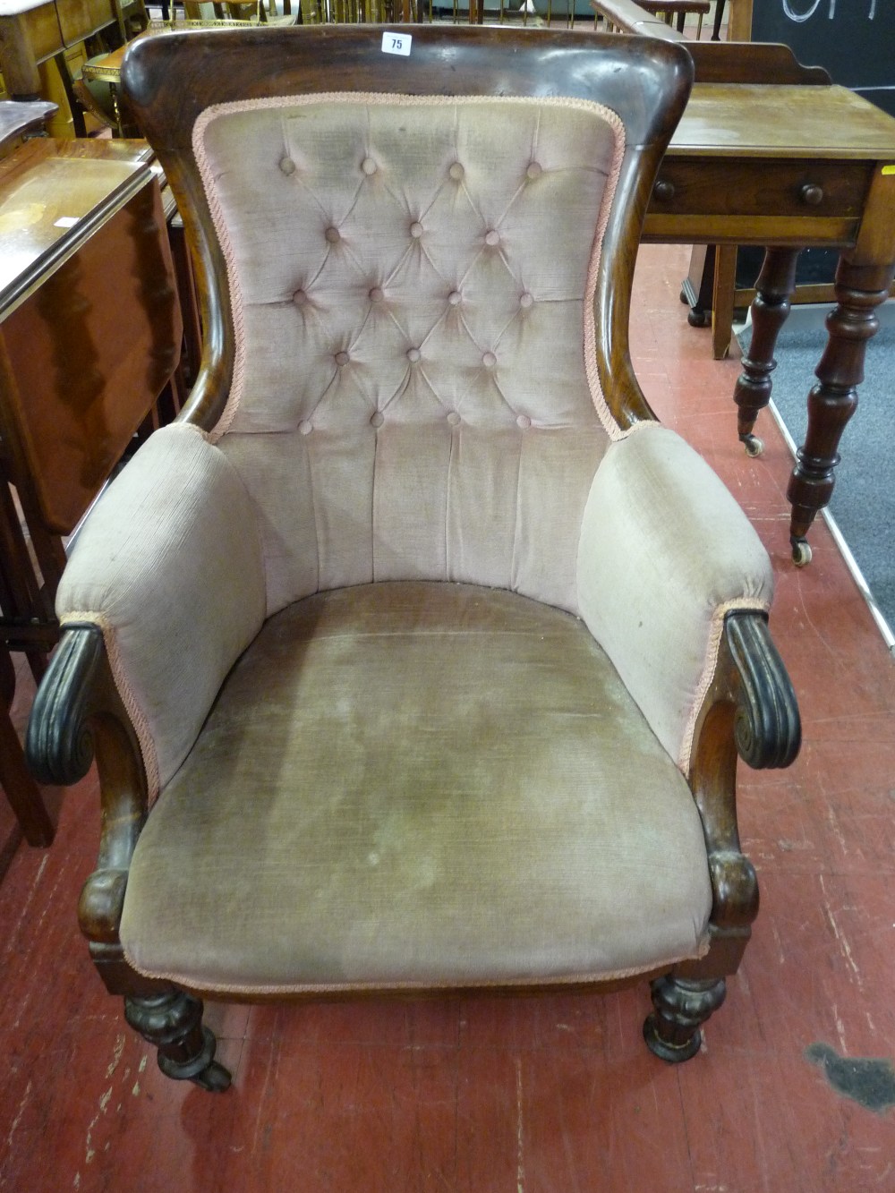 A VICTORIAN ROSEWOOD BUTTON BACK UPHOLSTERED ARMCHAIR, 94 cms high, 65 cms wide