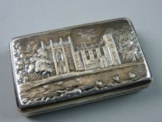 A NATHANIEL MILLS CASTLE TOP SILVER SNUFF BOX of rectangular form with gilt interior showing