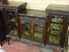 A LATE VICTORIAN DISPLAY CABINET, a three section display with carved and applied decoration,