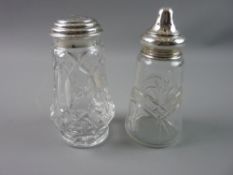 TWO HALLMARKED SILVER TOPPED CUT GLASS SUGAR SIFTERS, hallmarks for London 1928 and Sheffield