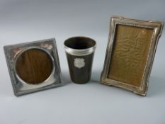 TWO SILVER MOUNTED PHOTOGRAPH FRAMES and a horn beaker with silver rim, the beaker mounted with a
