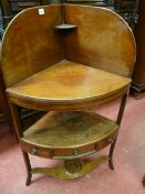 A GEORGIAN MAHOGANY CORNER WASHSTAND with raised splashback and lift-off aperture cover, mid-section