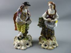 A PAIR OF 19th CENTURY DERBY STYLE FIGURES 'The Idyllic Musicians', the man with tambour and horn,