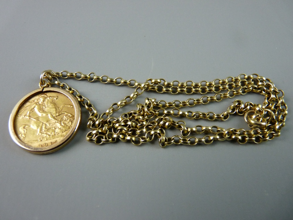 A GEORGE V HALF SOVEREIGN dated 1915 in a nine carat gold pendant mount with chain