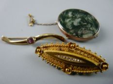 THREE VARIOUS GOLD BROOCHES including a Victorian oval brooch in fifteen carat gold set with nine