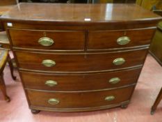 A VICTORIAN MAHOGANY BOW FRONT CHEST of two short over three long drawers having cock beaded