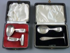 TWO BOXED SILVER SPOON AND PUSHER SETS, 1 troy oz, Sheffield 1957 and 1959 and 1.2 troy ozs,