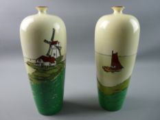 A PAIR OF ARTS & CRAFTS STYLE BALUSTER VASES, hand painted on a cream ground showing a coastal