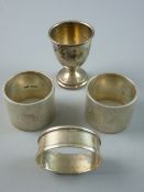 A PAIR OF VERY HEAVY ENGINE TURNED WIDE SILVER NAPKIN RINGS, 6 ozs, Birmingham 1913 and a silver