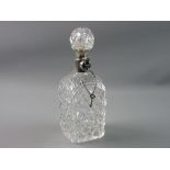 A HEAVY SQUARE HOBNAIL DECORATED WHISKY DECANTER having an elaborate silver locking collar with