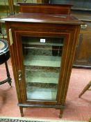 A CIRCA 1900 MAHOGANY MUSIC CABINET with railback top, boxwood and string inlay, single glazed