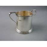 A PLAIN SILVER MUG of slightly tapered form with twin handles, 5.5 troy ozs, Sheffield 1927 by James