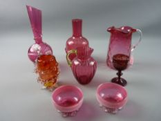 A PARCEL OF CRANBERRY GLASSWARE including a pair of circular white lined salts on plain supports,