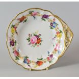 A NANTGARW PORCELAIN SHELL DISH having a lobed border and London decorated with a continuous chain