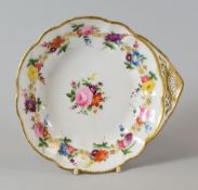 A NANTGARW PORCELAIN SHELL DISH having a lobed border and London decorated with a continuous chain