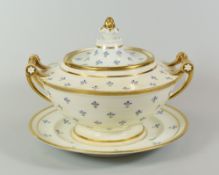 A SWANSEA PORCELAIN SAUCE TUREEN & STAND raised on a circular base and having up-turned spindle