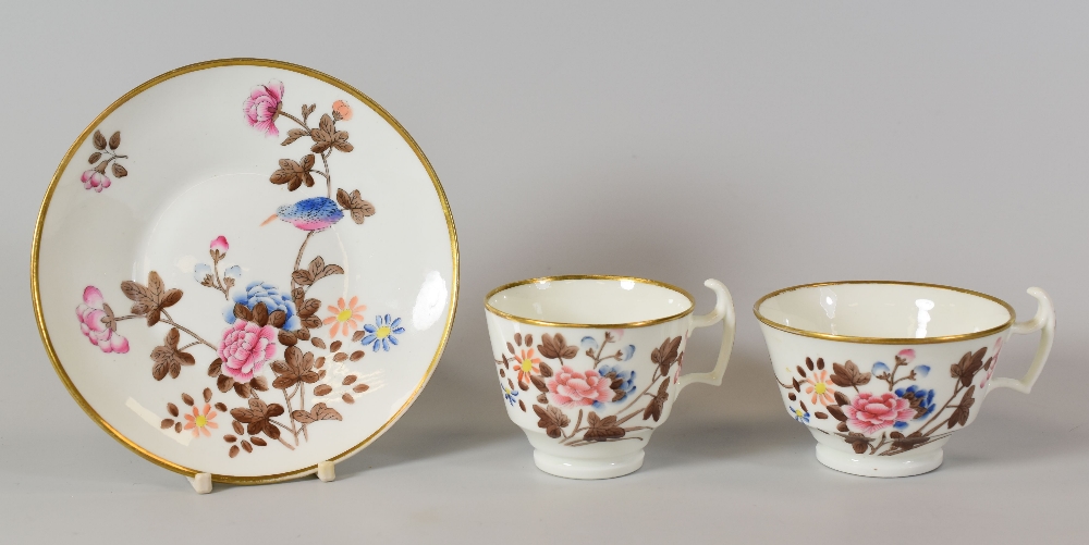 A SWANSEA 'KINGFISHER' PATTERN TRIO of two cups and saucer, transfer filled, Sir Leslie Joseph