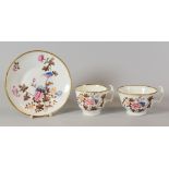 A SWANSEA 'KINGFISHER' PATTERN TRIO of two cups and saucer, transfer filled, Sir Leslie Joseph