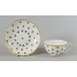 A NANTGARW PORCELAIN 'HENSOL CASTLE' CUP & SAUCER with blue berries and gilded leaves and with